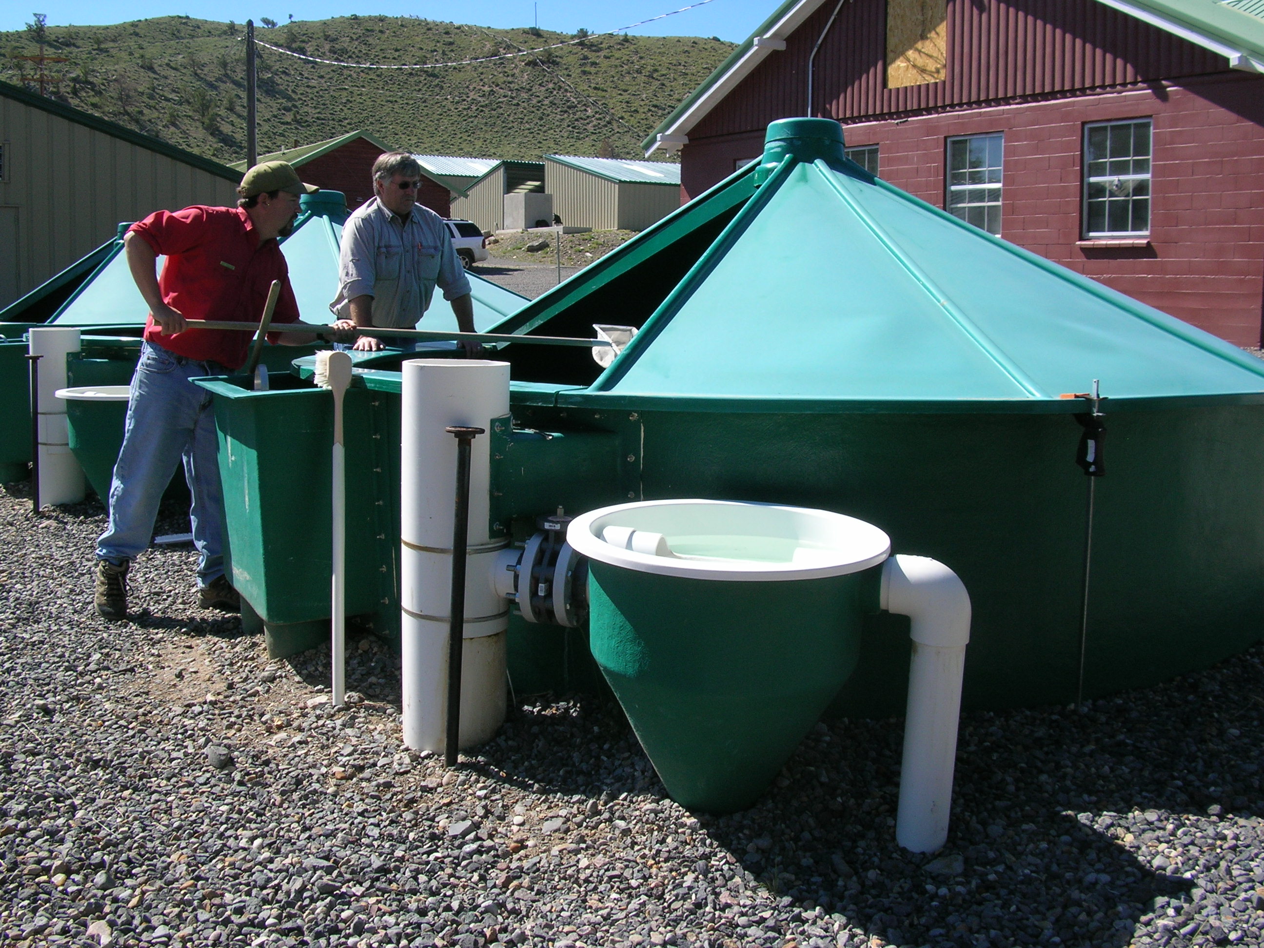 Men working on an aquaculture system